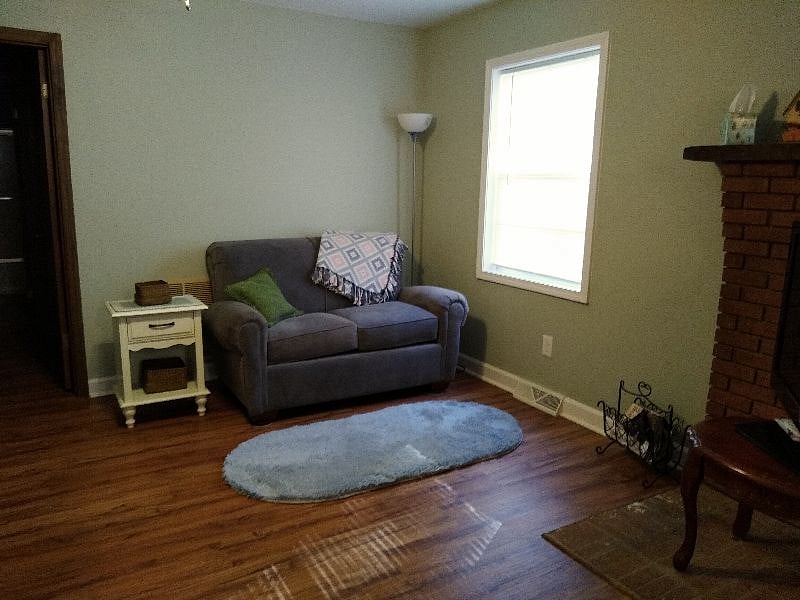 Open concept living room/kitchen area.