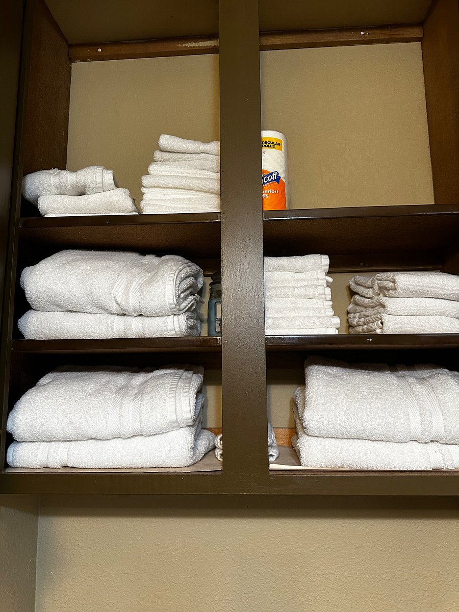 Linen closet in guest bathroom.