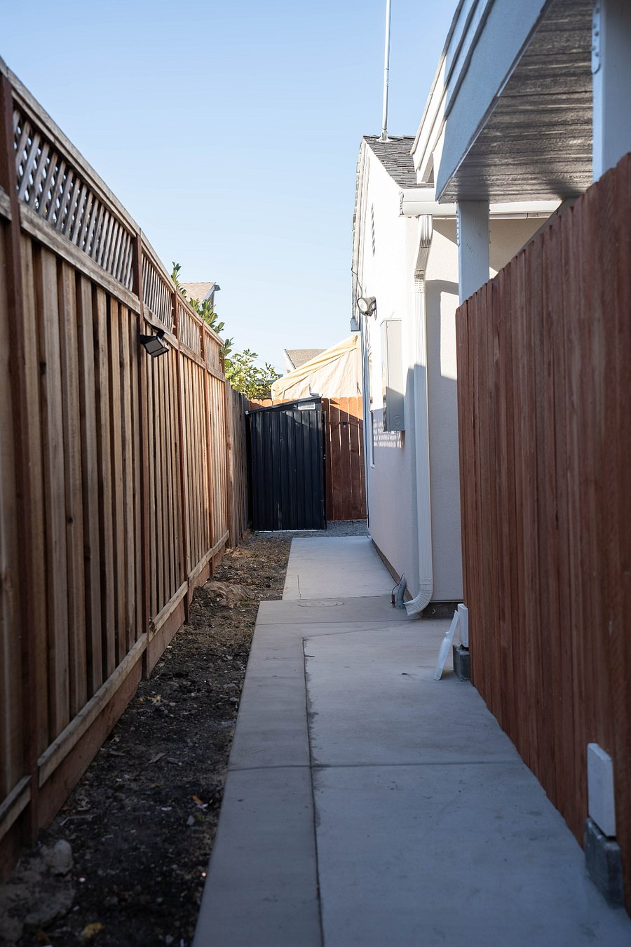 Walkway leading to patio and main entrance