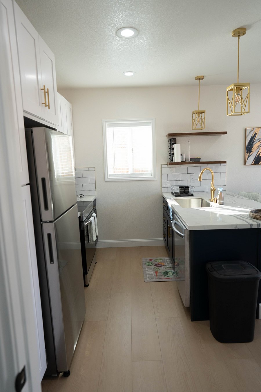 Full sized fridge, range, and dishwasher