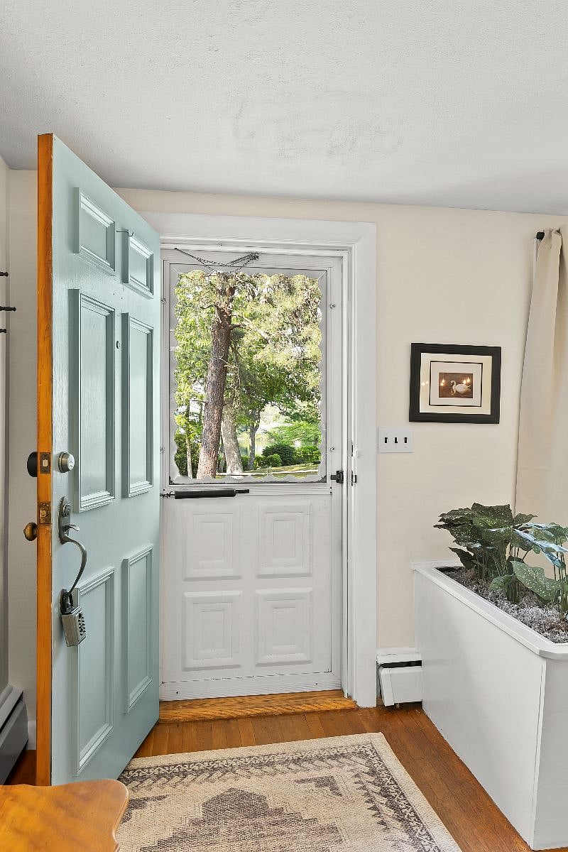 Looking out front door onto lake.