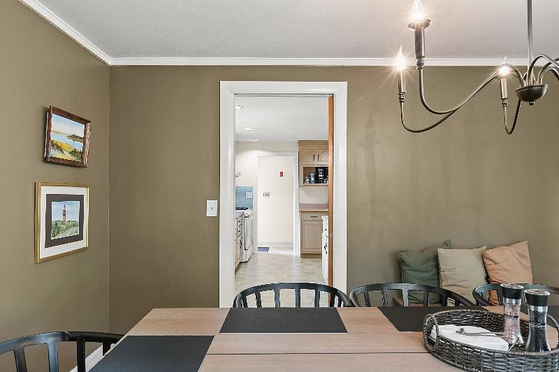 Dining room looking into kitchen.