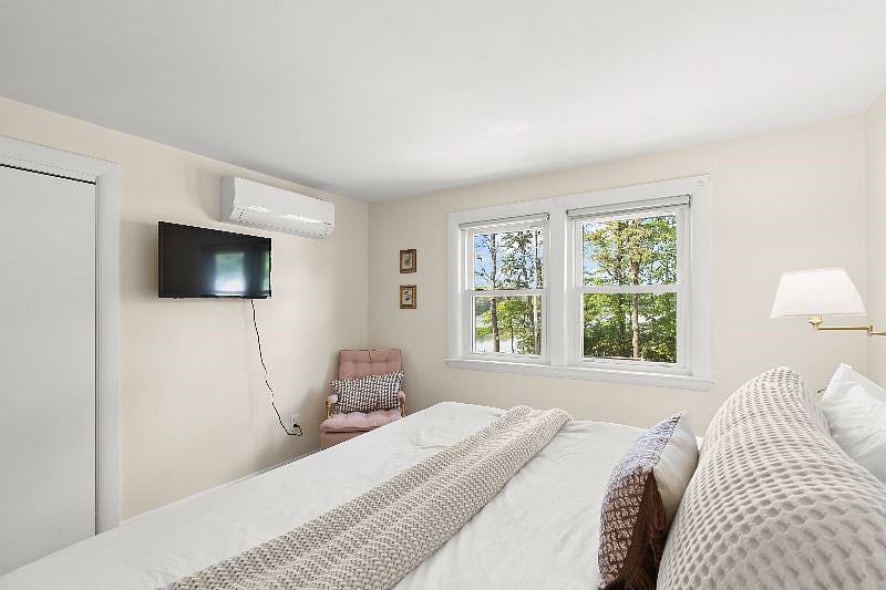 Upstairs King Bedroom 1 looking onto lake.