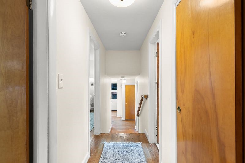 Upstairs hallway looking back into entry hall.