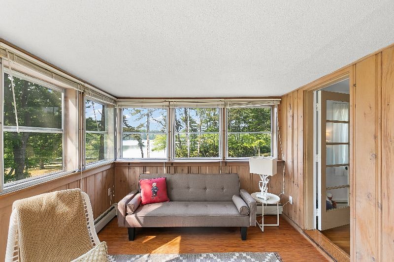 Upstairs Sun Room looking onto lake.