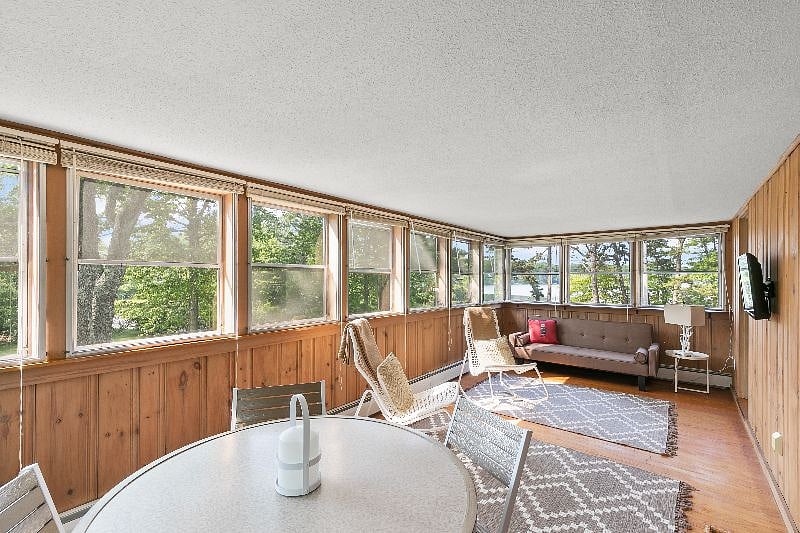 Upstairs Sun Room looking onto lake.
