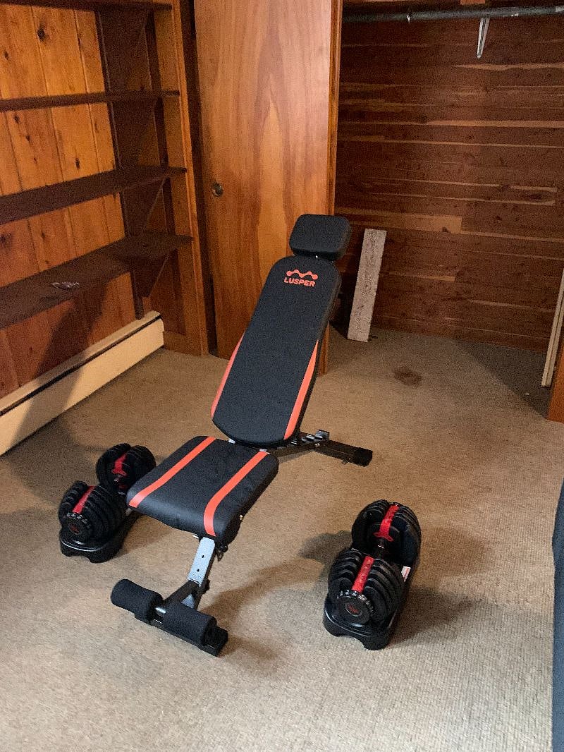 Bench and adjustable dumb bell set (up to 50 lbs).