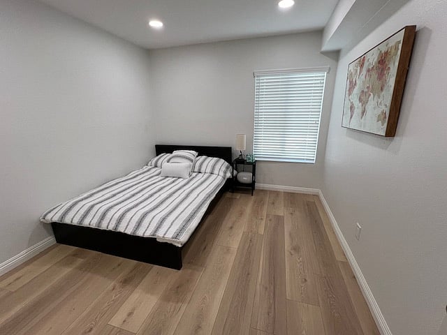 Second bedroom includes FULL size bed, nightstand and mirrored closet.