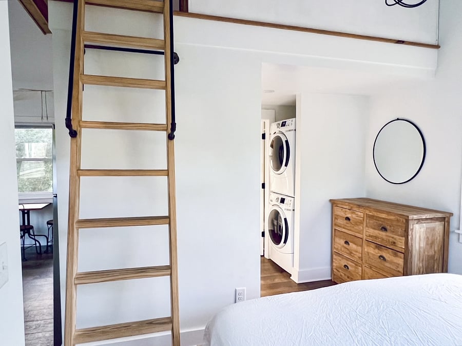 Ladder pulls out from the wall for easy access to the loft.