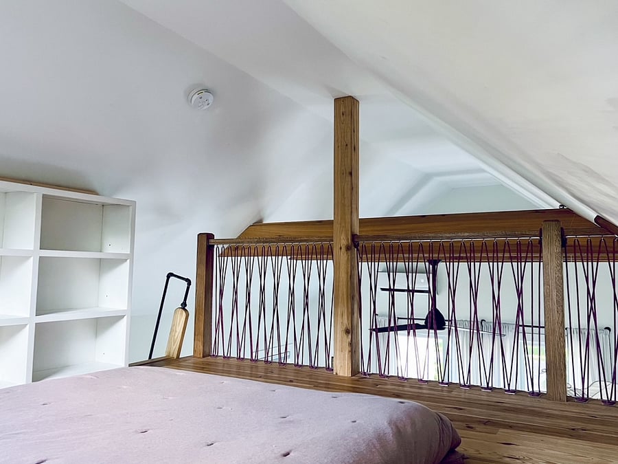 Loft has built in bookshelf and a queen mattress if you have guests visit you.