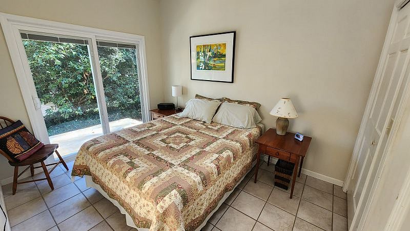 queen Tempur-Pedic bed.  42" flat screen 