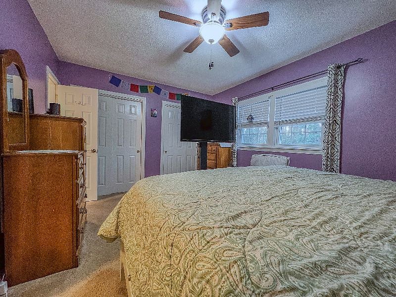 Main Bedroom with TV, ROKU, 2 closets and dressers