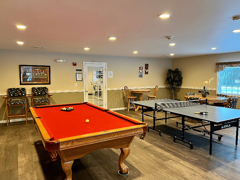 Inside Club House with Pool Table, Ping Pong Table, TV couch area