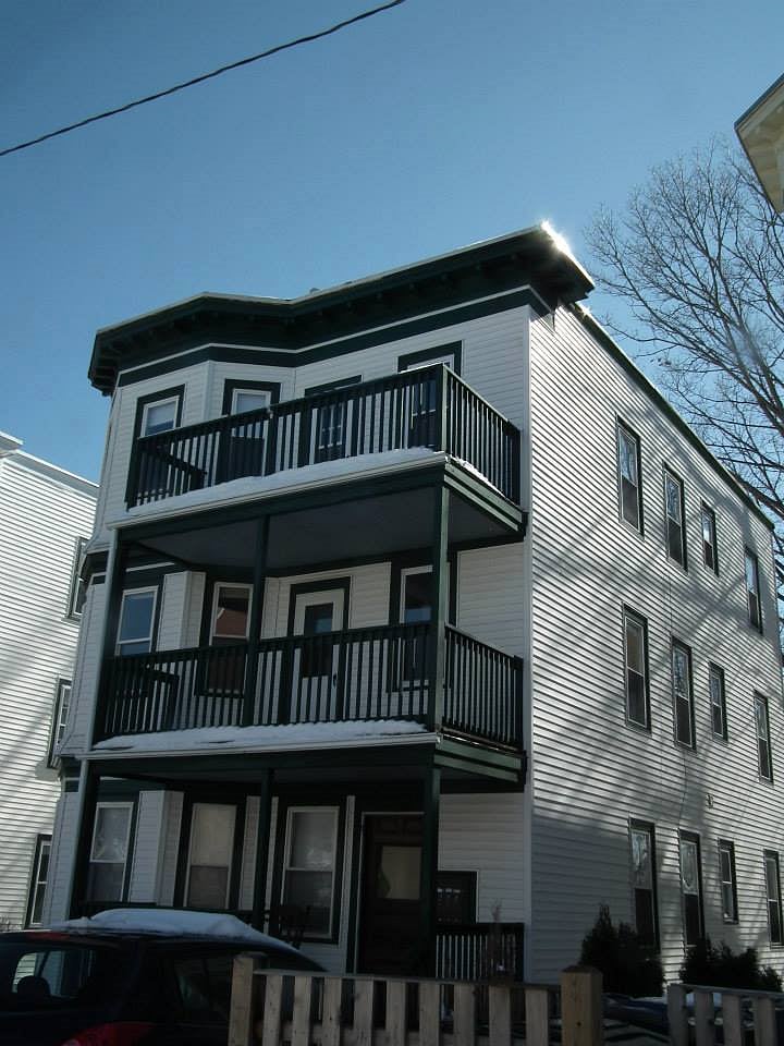 Top floor of a 3-family up two flights of stairs, front and rear