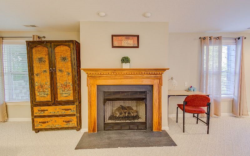 Wardrobe, Fireplace and Reading desk.