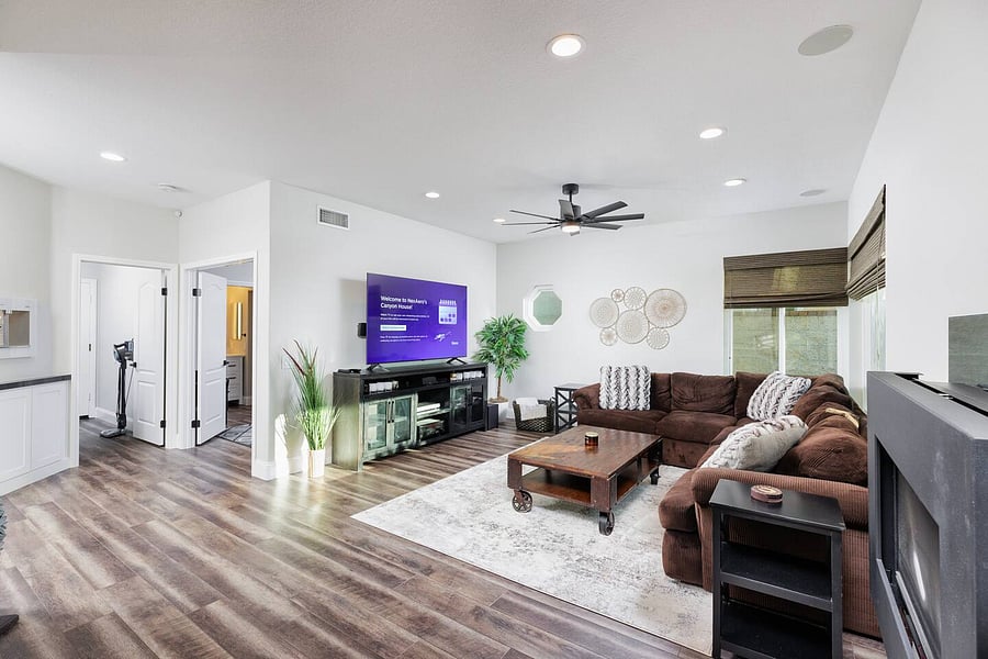 Spacious Informal family room, located adjacent from Luxury kitchen. 
Perfect spot for hosting sporting events with new 75' smart High End Surround Sound System, and Alexa.