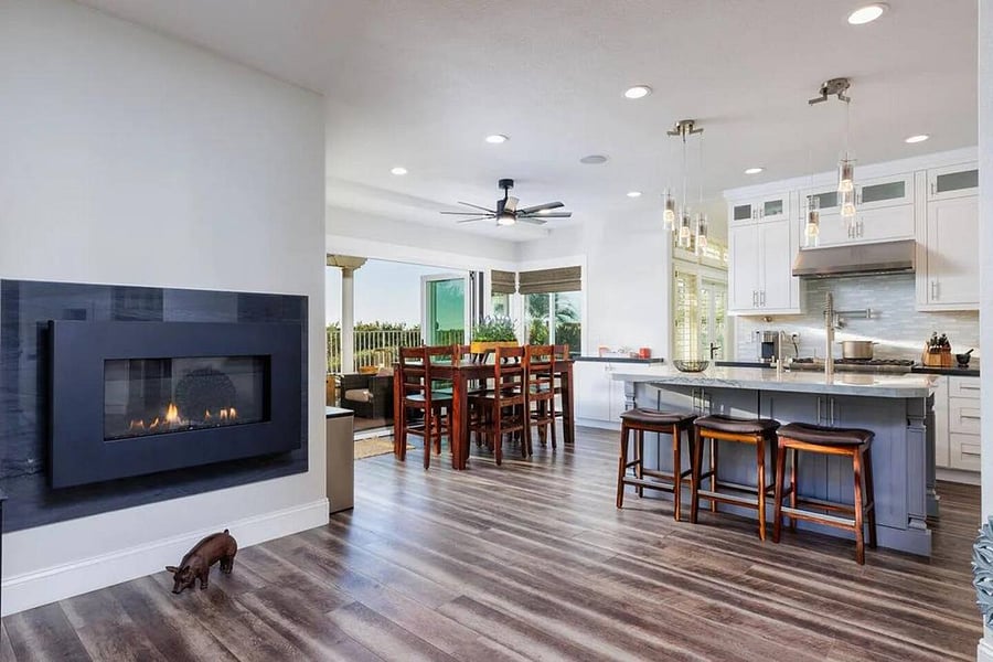 Large kitchen dining area over looking the stunning backyard views of Lake Mission Viejo. Extend your entertaining to the back yard with California style patio door.