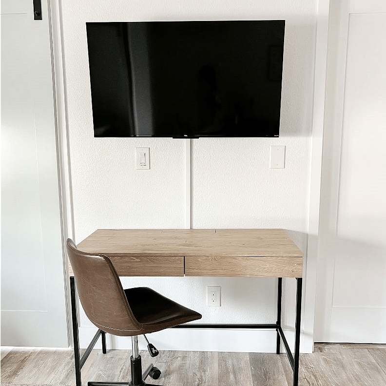 Desk for work or studying and smart Roku TV.
