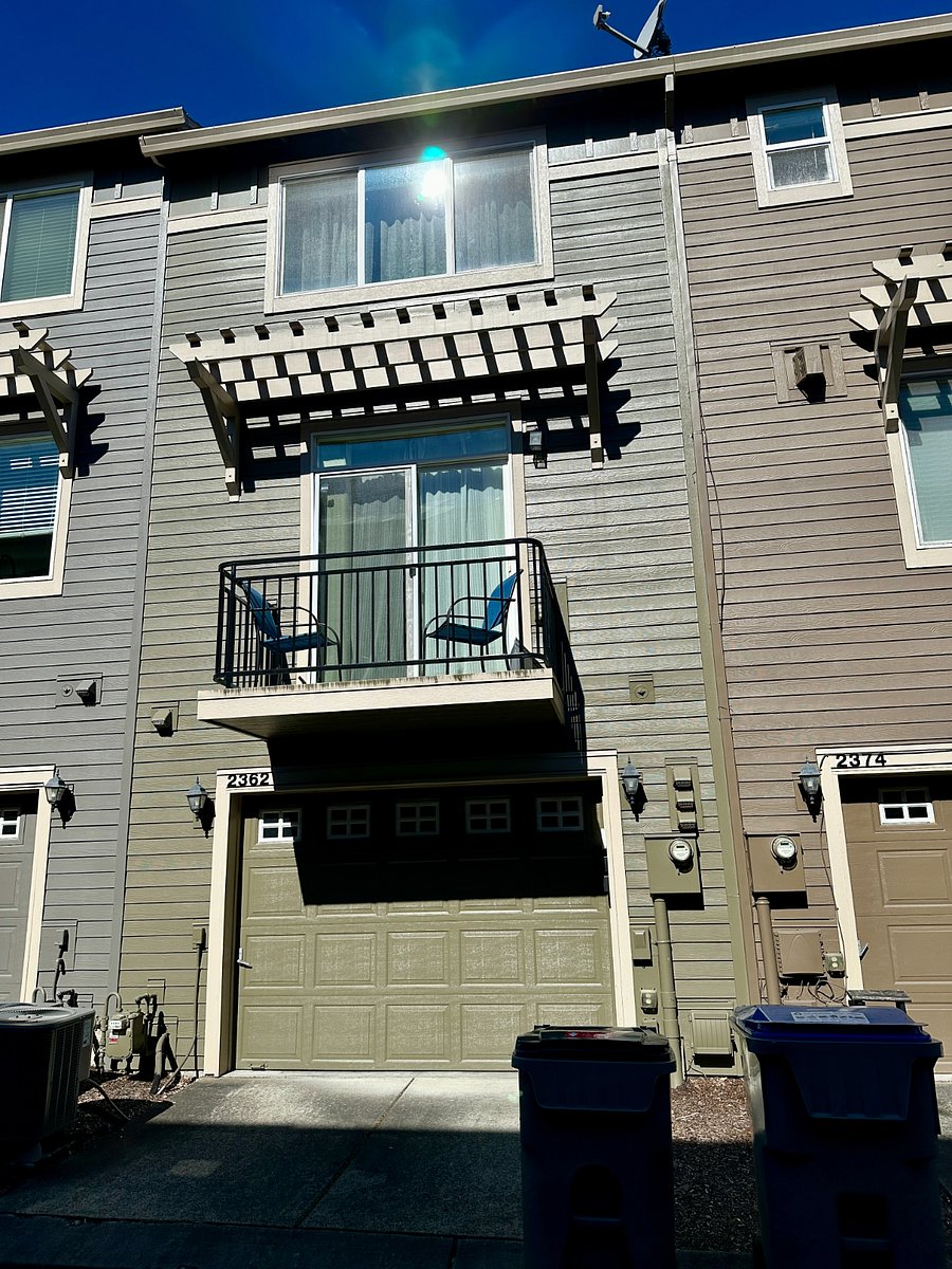 Garage and small balcony off of living area