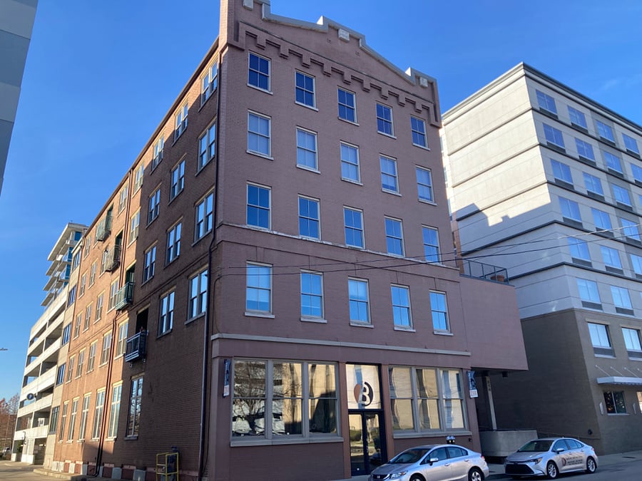 We are on top floor of 5-story building, see our sunny balcony. Newer, well lit parking garage just behind our building.