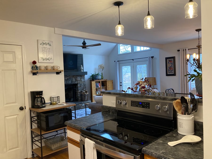 Kitchen is open to dining and living room.