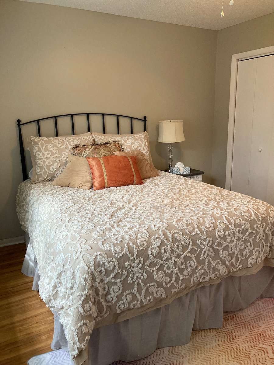 Bedroom with queen sized bed.