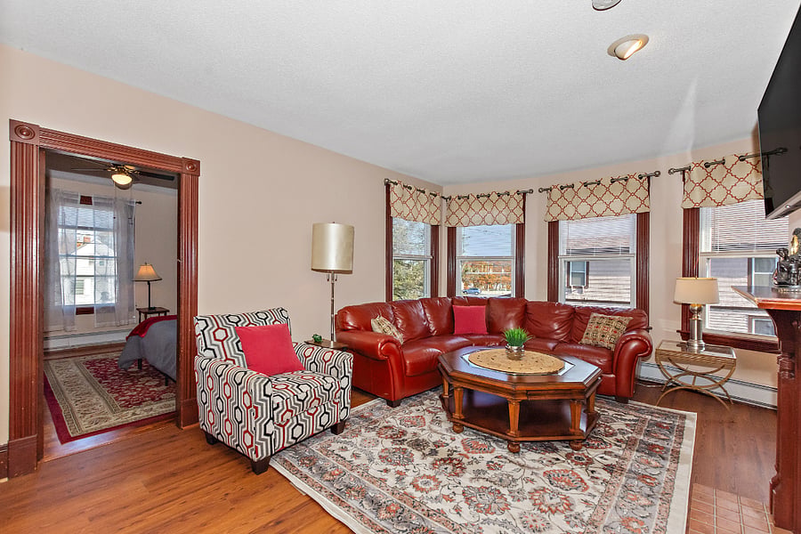 The living room is shared with occupant of 1 other guest room.