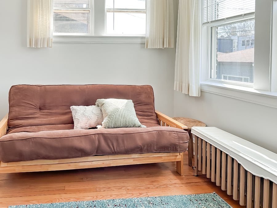 Rear bedroom/office (with futon folded). This room is divided from the kitchen via a heavy curtain.