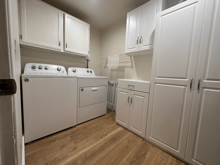 Walk in Laundry on Main Floor and storage area
