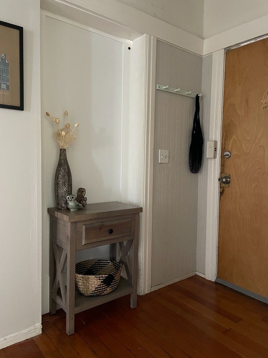 Hallway looking towards front door and entry table.