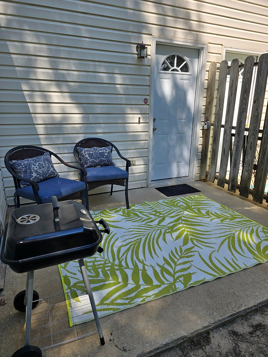 Relaxing back porch to grill 