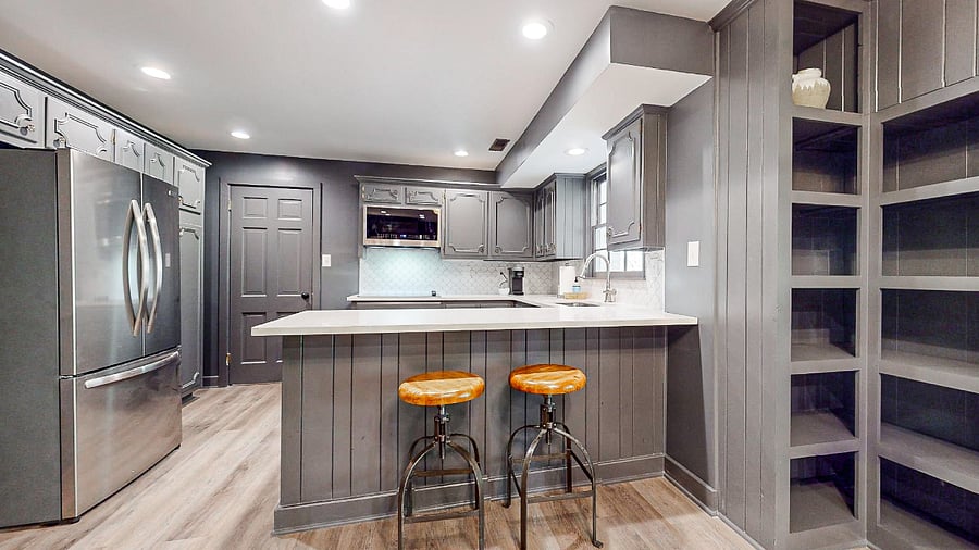 Full kitchen with electric stove-top, undermount sink, keurig, french door refrigerator and microwave with built-in air fryer and convection option. 
