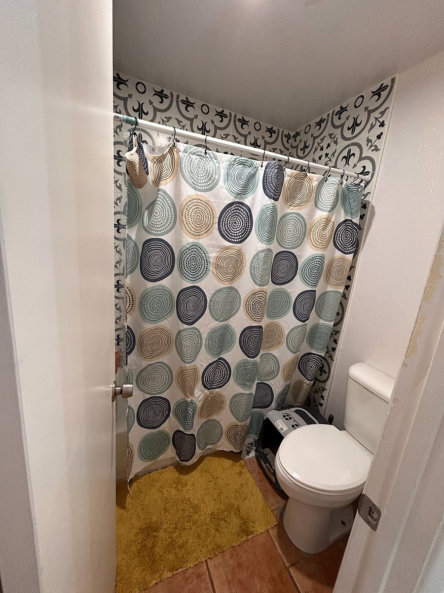 Closeup of actual shared shower area. 