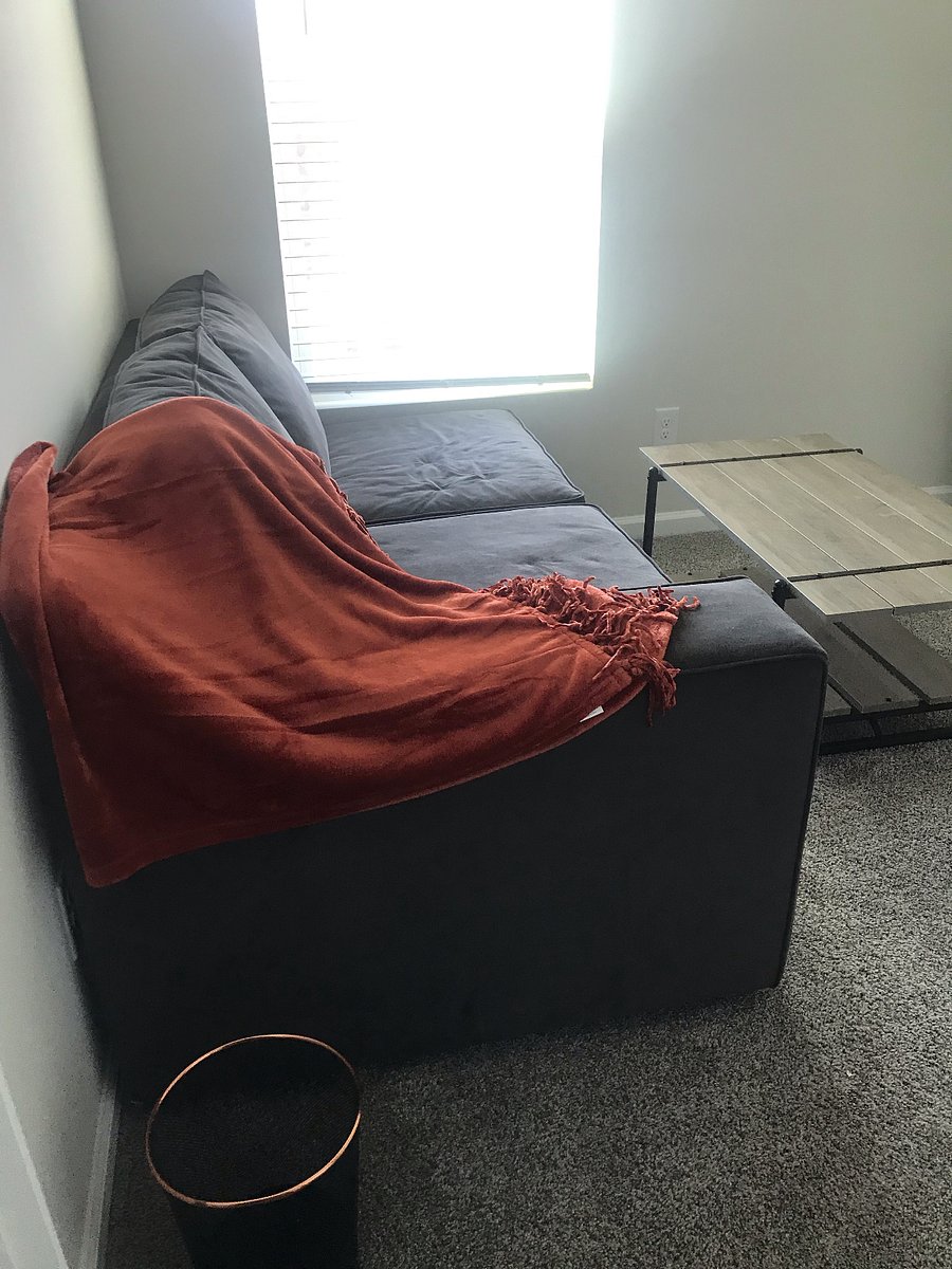 Sitting room with roku smart tv to be mounted and mini fridge to be set up.