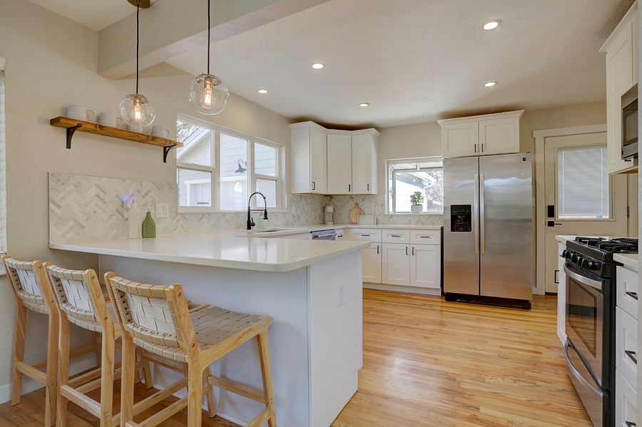 Island with seating and gas range