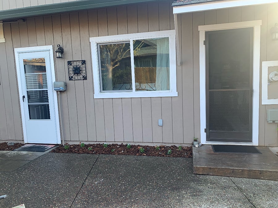 Front door to right, laundry door to left