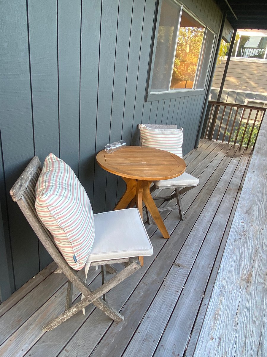 Own Private Deck with stairs going to the parking area