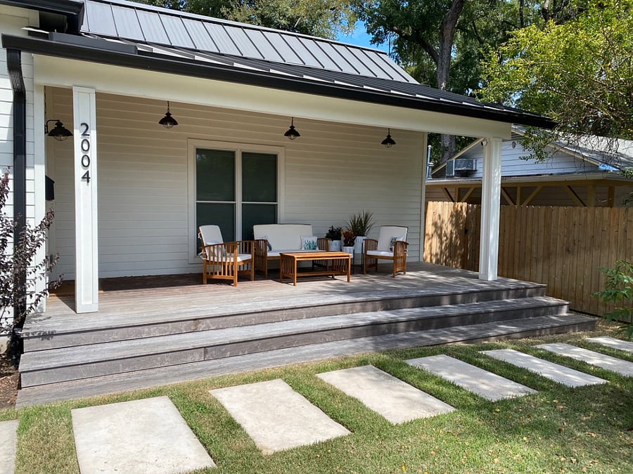 Huge front porch with no railings to obscure view; dimmable porch lights