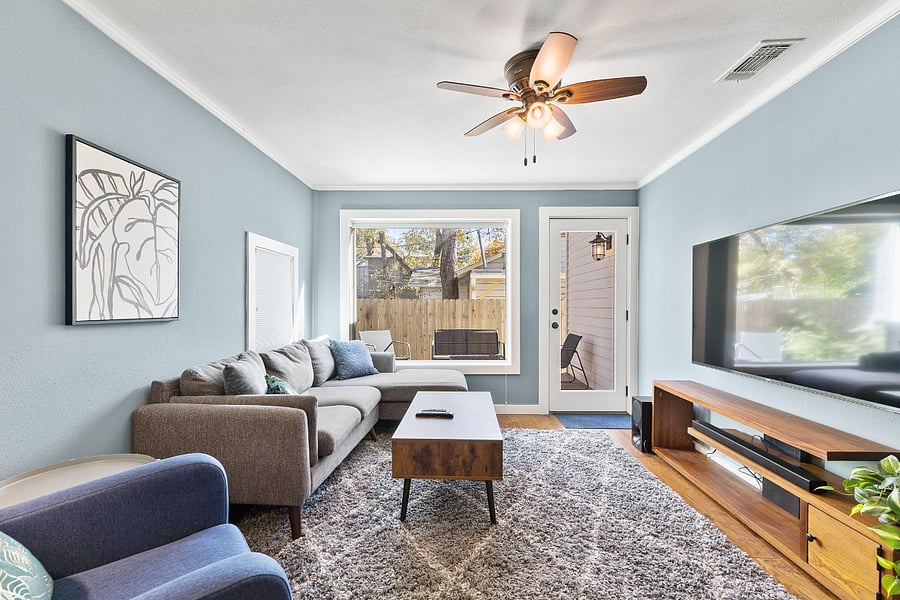 Bonus media room with 65" TV; opens onto side patio