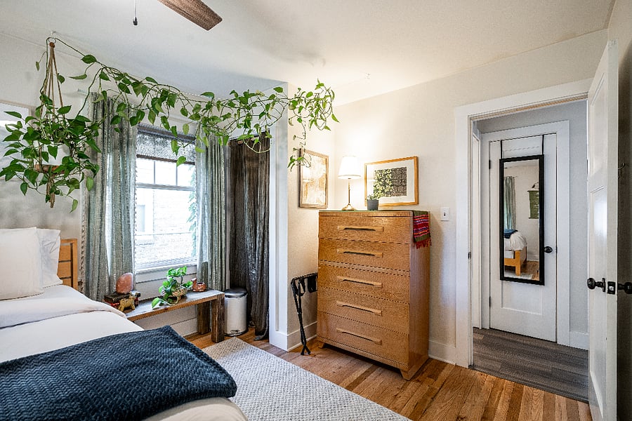 Storage and clothes rack in bedroom. 