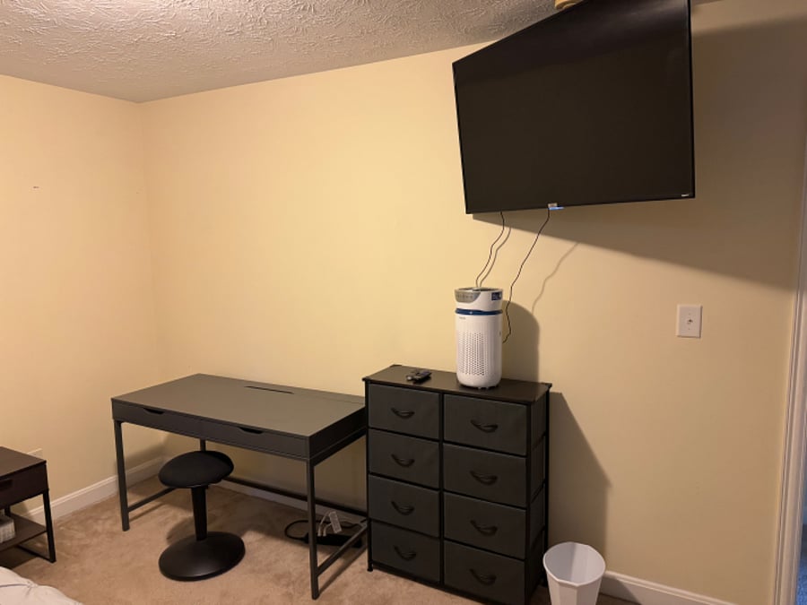 Roku 40 tv in bed room and a dehumidifier.