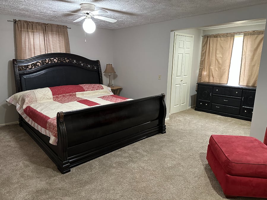 Primary bedroom with king bed - 2 walk-in closets