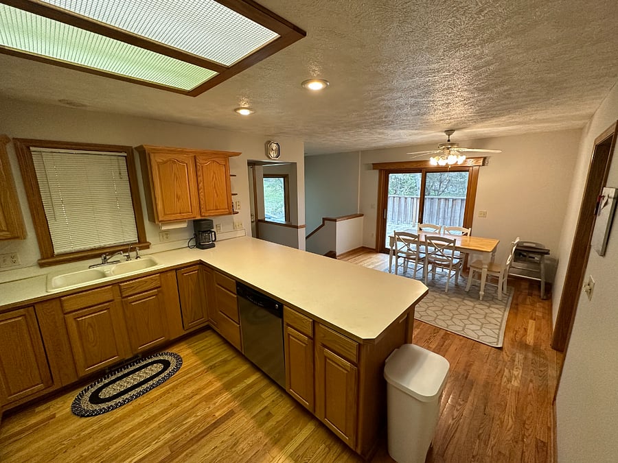 Kitchen with patio door to deck.