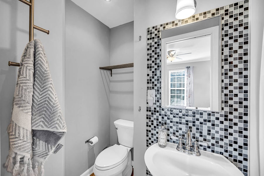Bathroom Attached to Queen Room with Green Velvet Bed