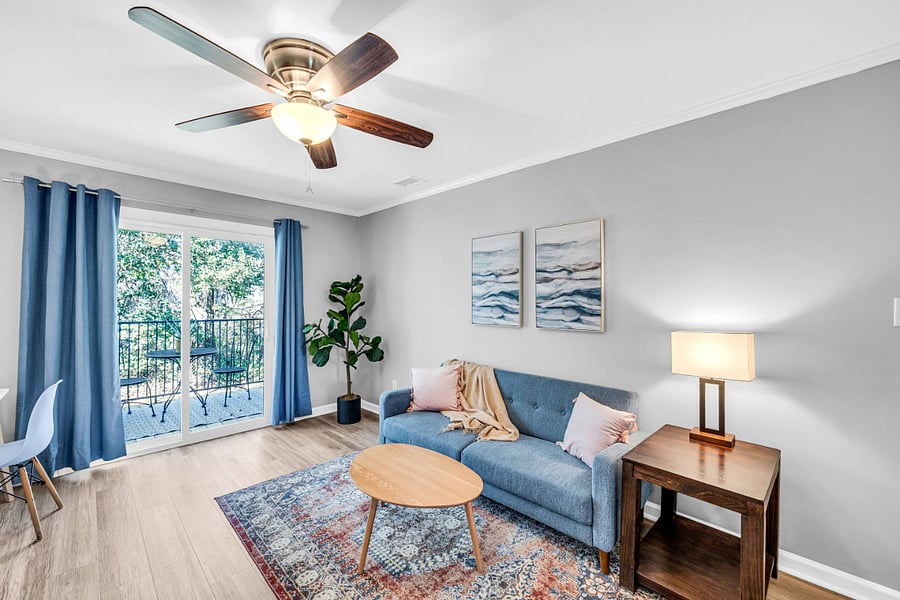 Cozy, Comfortable Living Area and Desk with Lots of Natural Light (or Close Room-Darkening Curtains for Privacy).