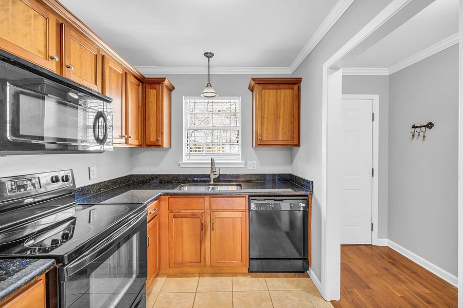 Kitchen area with granite countertops