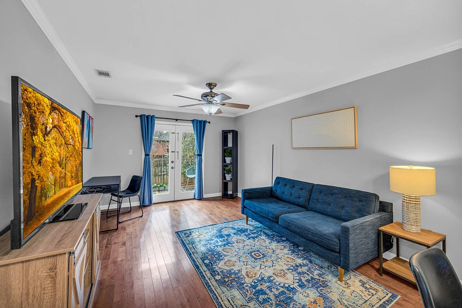 Living room and dedicated workspace.