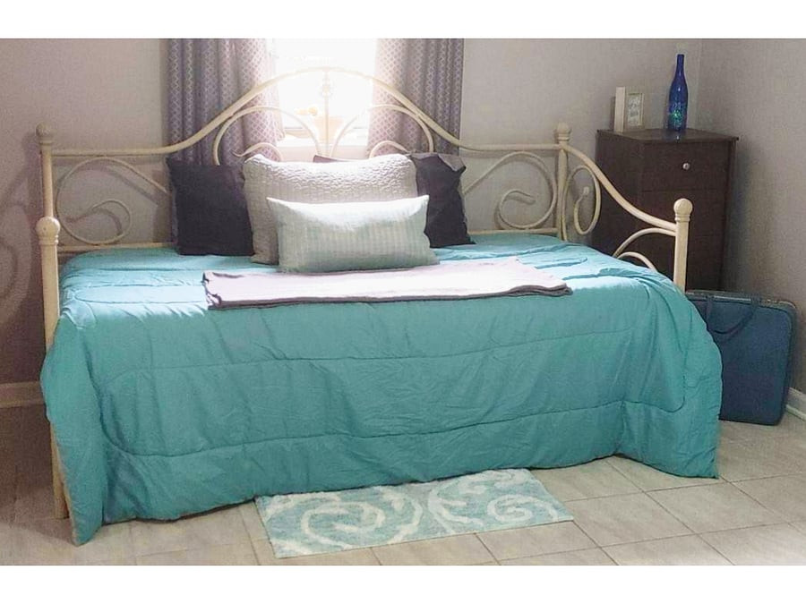 Plush daybed (twin/single) in master bedroom - situated by the window, makes for a perfect, comfy reading area