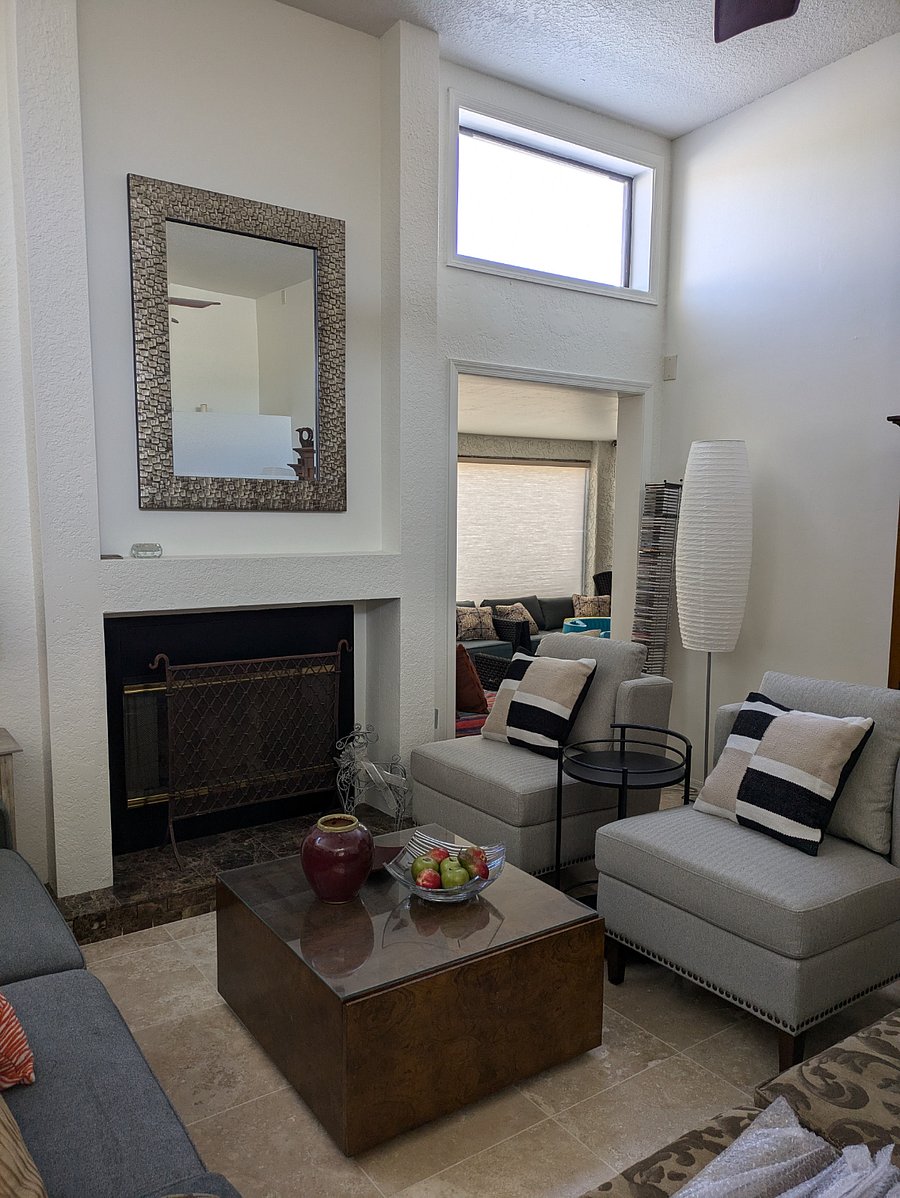 FORMAL LR WITH NEW SOFA AND NEW SIDE CHAIRS. COFFEE TABLE, TWO(2) SIDE TABLES, ENTERTAINMENT ARMOIRE AND LIQUOR ARMOIRE!