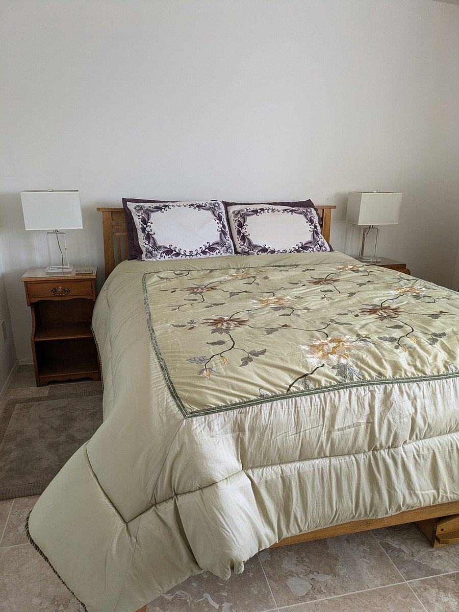 QUEEN BED IN LARGER BEDROOM WHICH IS $1600/MONTH